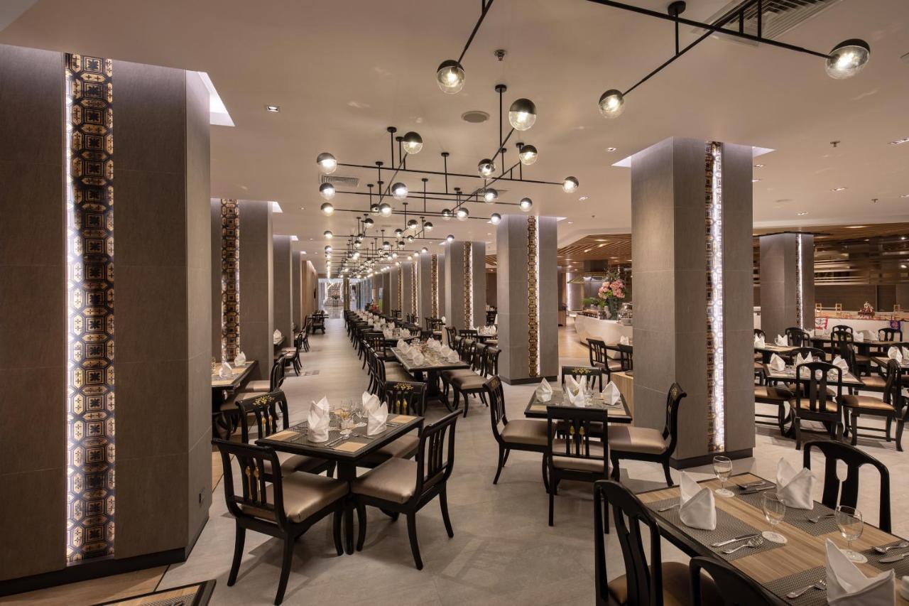 The Heritage Chiang Rai Hotel And Convention Esterno foto The restaurant's interior